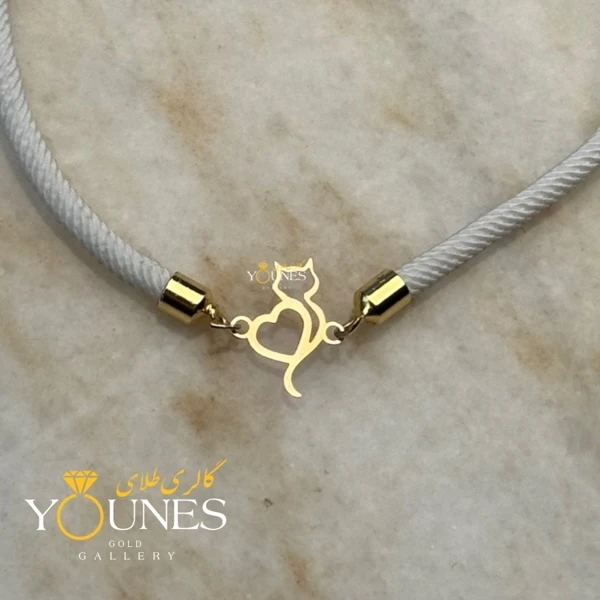 تصویر دوم دستبند قلب و گربه طلا لیزری